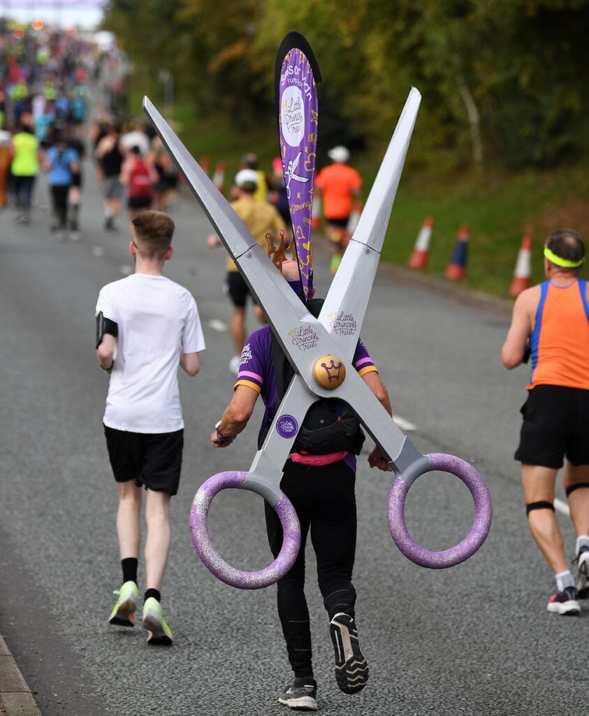 Running a marathon in fancy dress.